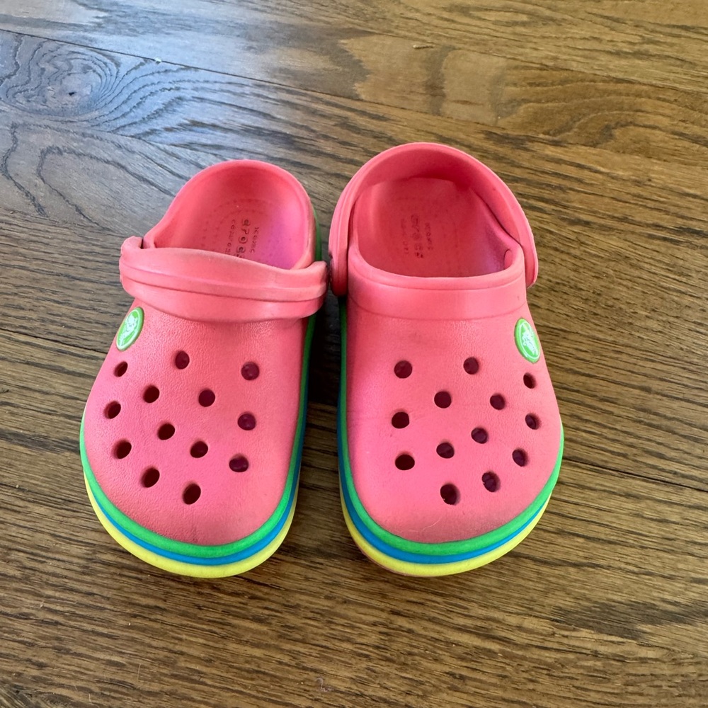 Pink rainbow crocs
